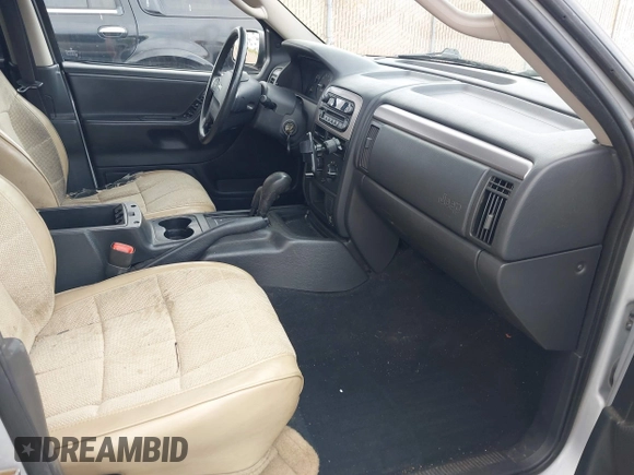2004 Jeep Grand Cherokee Laredo with VIN 1J4GW48N14C434351, listed as a IAAI auction lot 41860077 with 152,404 mi miles and . Bid and sale history available at DreamBid. Image 5.