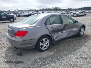 2005 Acura RL z VIN JH4KB16525C006978, wystawiony jako IAAI lot #41800979 z przebiegiem 213 501 mil mil oraz . Historia ofert i sprzedaży dostępna na DreamBid. Obrazek 4.