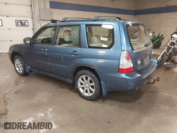 2007 Subaru Forester X w/Premium Pkg with VIN JF1SG65687G716673, listed as a IAAI auction lot 41539553 with 186,870 mi miles. Bid and sale history available at carsss.com. Image 3.