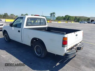 1994 Isuzu Pickup S z VIN JAACL11LXR7217702, wystawiony jako IAAI lot #41761090 z przebiegiem 198 468 mil mil oraz . Historia ofert i sprzedaży dostępna na DreamBid. Obrazek 3.