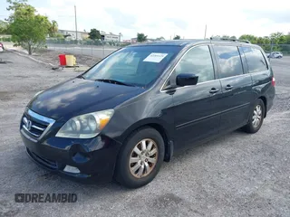 2007 Honda Odyssey Touring z VIN 5FNRL38827B059573, wystawiony jako IAAI lot #42261125 z przebiegiem 214 954 mil mil oraz . Historia ofert i sprzedaży dostępna na DreamBid. Obrazek 2.
