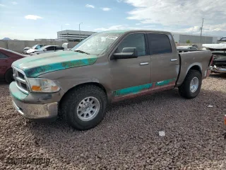 2010 Dodge Ram 1500 SLT with VIN 1D7RB1CP2AS141633, listed as a Copart auction lot 69499904 with 129,488 mi miles and Salvage Title. Bid and sale history available at carsss.com. Image 1.