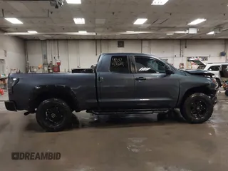 2009 Toyota Tundra 4WD Truck with VIN 5TFBW54199X091510, listed as a IAAI auction lot 42025369 with 234,784 mi miles. Bid and sale history available at carsss.com. Image 13.
