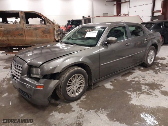 2008 Chrysler 300 Touring with VIN 2C3KA53G18H180306, listed as a IAAI auction lot 41514398 with 204,535 mi miles. Bid and sale history available at carsss.com. Image 2.