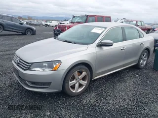 2014 Volkswagen Passat Wolfsburg Edition with VIN 1VWAT7A33EC060225, listed as a IAAI auction lot 41818949 with 163,545 mi miles and . Bid and sale history available at DreamBid. Image 2.