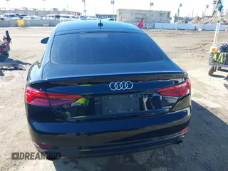 2018 Audi A5 Sportback Premium z VIN WAUANCF53JA009200, wystawiony jako IAAI lot #41725501 z przebiegiem 107 076 mil mil oraz . Historia ofert i sprzedaży dostępna na DreamBid. Obrazek 17.
