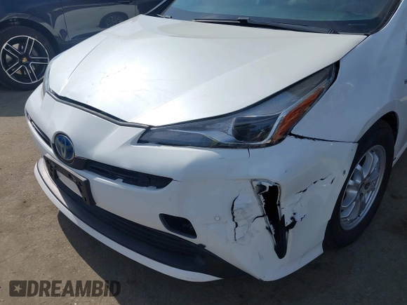 2022 Toyota Prius L Eco z VIN JTDKAMFU6N3177732, wystawiony jako IAAI lot #42504790 z przebiegiem 65 338 mil mil oraz . Historia ofert i sprzedaży dostępna na DreamBid. Obrazek 6.