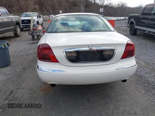 1998 Lincoln Continental with VIN 1LNFM97VXWY619313, listed as a IAAI auction lot 41477852 with 158,973 mi miles. Bid and sale history available at carsss.com. Image 17.