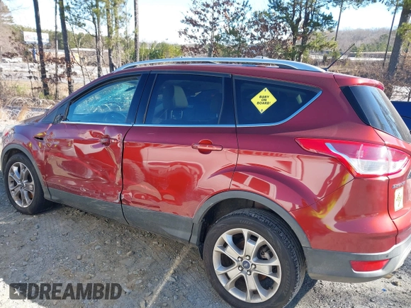 2015 Ford Escape Titanium with VIN 1FMCU0J92FUB55712, listed as a IAAI auction lot 41627867 with 156,438 mi miles. Bid and sale history available at carsss.com. Image 14.