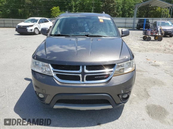 2017 Dodge Journey SXT z VIN 3C4PDCBG0HT509616, wystawiony jako Copart lot #55271225 z przebiegiem 107 099 mil mil oraz Szkoda całkowita • Salvage title. Historia ofert i sprzedaży dostępna na DreamBid. Obrazek 5.