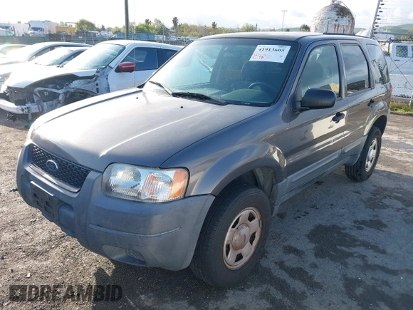 2004 Ford Escape with VIN 1FMCU02174KA61956, listed as a IAAI auction lot 41913605 with 166,587 mi miles and . Bid and sale history available at DreamBid. Image 2.