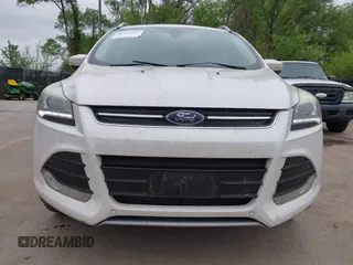 2016 Ford Escape Titanium with VIN 1FMCU9J96GUB97564, listed as a IAAI auction lot 42137663 with 269,009 mi miles. Bid and sale history available at carsss.com. Image 6.