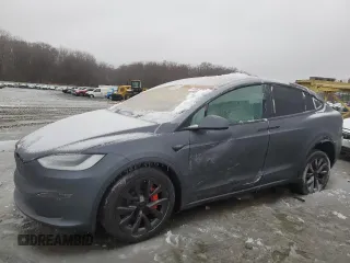2023 Tesla Model X Plaid with VIN 7SAXCBE63PF383509, listed as a Copart auction lot 43636985 with 26,927 mi miles and Salvage Title. Bid and sale history available at DreamBid. Image 1.