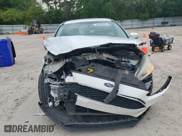 2016 Ford Focus SE with VIN 1FADP3F26GL369418, listed as a Copart auction lot 54256525 with 139,871 mi miles and Salvage title. Bid and sale history available at DreamBid. Image 5.