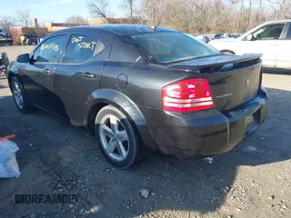 2008 Dodge Avenger SXT with VIN 1B3LC56RX8N236243, listed as a IAAI auction lot 41847970 with 140,386 mi miles. Bid and sale history available at carsss.com. Image 3.