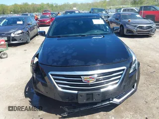 2017 Cadillac CT6 Luxury AWD z VIN 1G6KD5RS5HU133097, wystawiony jako IAAI lot #42144553 z przebiegiem 167 460 mil mil oraz . Historia ofert i sprzedaży dostępna na DreamBid. Obrazek 13.