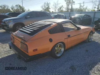 1983 Datsun 280ZX z VIN JN1HZ04S1DX572036, wystawiony jako Copart lot #76533294 z przebiegiem 172 147 mil mil oraz Nie do naprawy. Historia ofert i sprzedaży dostępna na DreamBid. Obrazek 3.
