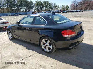 2009 BMW 1 Series 128i with VIN WBAUP93519VF48985, listed as a Copart auction lot 50715925 with 105,590 mi miles and Salvage title. Bid and sale history available at DreamBid. Image 2.