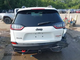 2021 Jeep Cherokee Trailhawk with VIN 1C4PJMBX4MD124980, listed as a IAAI auction lot 42372537 with 55,667 mi miles and . Bid and sale history available at DreamBid. Image 17.