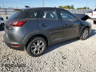 2016 Mazda CX-3 Touring z VIN JM1DKBC74G0114397, wystawiony jako Copart lot #63586572 z przebiegiem 73 759 mil mil oraz . Historia ofert i sprzedaży dostępna na DreamBid. Obrazek 4.