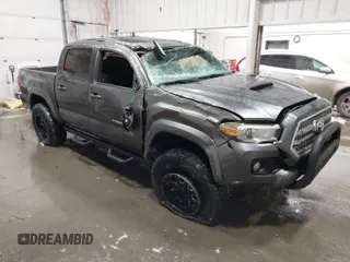 2016 Toyota Tacoma SR with VIN 3TMCZ5AN1GM019769, listed as a IAAI auction lot 41804693 with 157,138 mi miles. Bid and sale history available at carsss.com. Image 1.