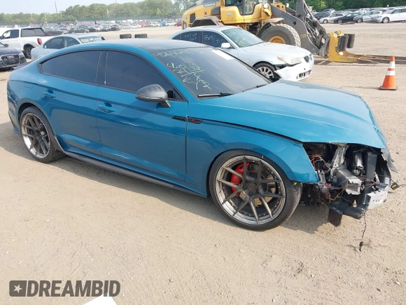 2023 Audi S5 Sportback Premium Plus z VIN WAUC4CF50PA004945, wystawiony jako IAAI lot #42476245 z przebiegiem 46 079 mil mil oraz . Historia ofert i sprzedaży dostępna na DreamBid. Obrazek 1.