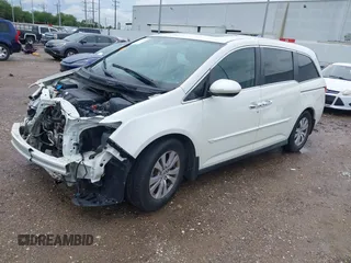 2016 Honda Odyssey EX-L z VIN 5FNRL5H61GB030771, wystawiony jako IAAI lot #42459561 z przebiegiem 130 541 mil mil oraz . Historia ofert i sprzedaży dostępna na DreamBid. Obrazek 21.