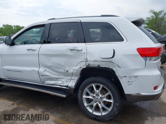 2015 Jeep Grand Cherokee Summit with VIN 1C4RJFJG5FC104087, listed as a IAAI auction lot 42100298 with 88,710 mi miles and . Bid and sale history available at DreamBid. Image 6.