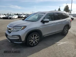 2020 Honda Pilot Touring 8-Passenger with VIN 5FNYF5H96LB005680, listed as a Copart auction lot 86409524 with 78,759 mi miles and Salvage Title. Bid and sale history available at DreamBid. Image 1.