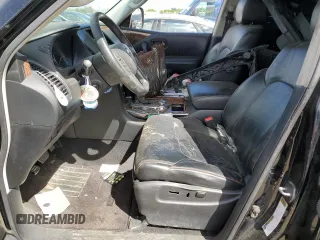 2017 Nissan Armada Platinum z VIN JN8AY2NCXH9504904, wystawiony jako Copart lot #58023935 z przebiegiem Nie podano mil oraz Szkoda całkowita • Salvage title. Historia ofert i sprzedaży dostępna na DreamBid. Obrazek 7.