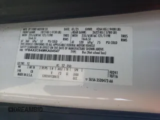 2021 Ford Transit Passenger XL with VIN 1FBAX2C84MKA04547, listed as a Copart auction lot 72682074 with 87,077 mi miles and Salvage Title. Bid and sale history available at DreamBid. Image 14.