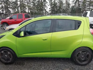 2015 Chevrolet Spark LS with VIN KL8CB6S98FC728462, listed as a IAAI auction lot 41653899 with 105,432 mi miles and . Bid and sale history available at DreamBid. Image 14.