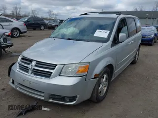 2010 Dodge Grand Caravan SXT with VIN 2D4RN5D13AR180609, listed as a IAAI auction lot 41857215 with Not Provided miles and . Bid and sale history available at DreamBid. Image 2.