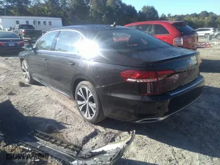 2021 Volkswagen Passat 2.0T SE with VIN 1VWSA7A34MC014993, listed as a IAAI auction lot 40556424 with 64,508 mi miles. Bid and sale history available at carsss.com. Image 3.