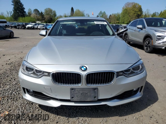 2014 BMW 3 Series 335i xDrive with VIN WBA3B9C56EP458673, listed as a Copart auction lot 52934245 with 37,852 mi miles and Salvage title. Bid and sale history available at DreamBid. Image 5.