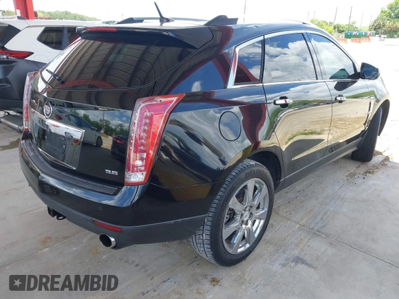 2012 Cadillac SRX Premium Collection z VIN 3GYFNCE36CS615725, wystawiony jako IAAI lot #42738584 z przebiegiem 156 625 mil mil oraz . Historia ofert i sprzedaży dostępna na DreamBid. Obrazek 4.