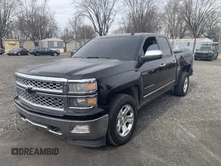 2014 Chevrolet Silverado 1500 LTZ with VIN 1GCVKSEC0EZ265504, listed as a IAAI auction lot 41737186 with 215,850 mi miles and . Bid and sale history available at DreamBid. Image 2.