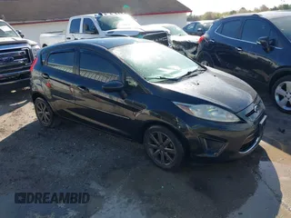 2011 Ford Fiesta SE with VIN 3FADP4EJ1BM141705, listed as a IAAI auction lot 41742437 with 145,173 mi miles. Bid and sale history available at carsss.com. Image 1.
