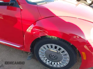 2013 Volkswagen Beetle with VIN 3VWHX7AT3DM682758, listed as a IAAI auction lot 40869170 with 88,793 mi miles and . Bid and sale history available at DreamBid. Image 6.