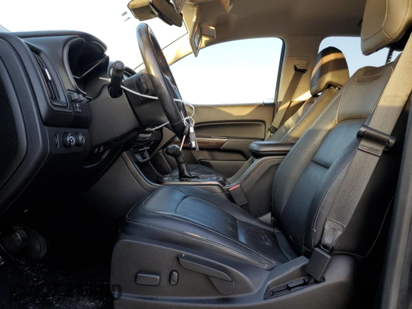 2016 GMC Canyon 4WD SLT with VIN 1GTP6DE12G1236580, listed as a Copart auction lot 80282024 with 103,854 mi miles and Salvage Title. Bid and sale history available at carsss.com. Image 7.