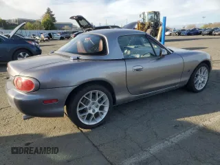 2002 Mazda MX-5 Miata Cloth with VIN JM1NB353X20228420, listed as a Copart auction lot 47949235 with 94,341 mi miles and Salvage title. Bid and sale history available at DreamBid. Image 3.