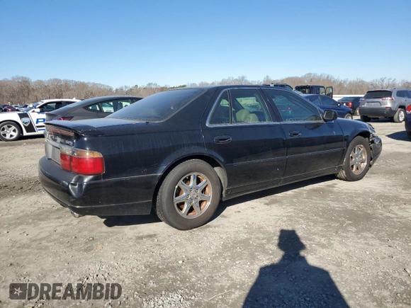2000 Cadillac Seville Touring STS z VIN 1G6KY5495YU177352, wystawiony jako Copart lot #86020444 z przebiegiem Nie podano mil oraz Szkoda całkowita • Salvage title. Historia ofert i sprzedaży dostępna na DreamBid. Obrazek 3.