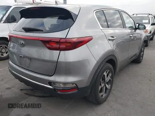 2020 Kia Sportage LX with VIN KNDPM3AC5L7759283, listed as a IAAI auction lot 41901056 with 71,123 mi miles and . Bid and sale history available at carsss.com. Image 4.
