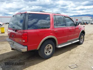 2002 Ford Expedition Eddie Bauer with VIN 1FMPU18LX2LA99978, listed as a IAAI auction lot 42692578 with 143,127 mi miles and . Bid and sale history available at DreamBid. Image 4.