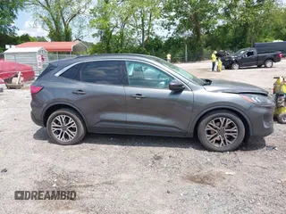 2020 Ford Escape SEL with VIN 1FMCU0H69LUB18115, listed as a IAAI auction lot 42163227 with 92,793 mi miles and . Bid and sale history available at DreamBid. Image 13.