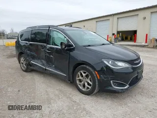 2017 Chrysler Pacifica Touring L z VIN 2C4RC1BG1HR795009, wystawiony jako IAAI lot #41531636 z przebiegiem 179 979 mil mil oraz . Historia ofert i sprzedaży dostępna na DreamBid. Obrazek 1.