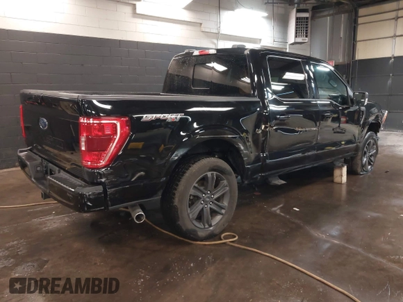 2023 Ford F-150 XL with VIN 1FTFW1E5XPKE80999, listed as a IAAI auction lot 41596993 with 33,285 mi miles. Bid and sale history available at carsss.com. Image 4.