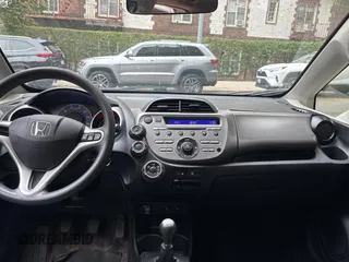 2013 Honda Fit с VIN JHMGE8G33DC052143, выставлен на аукционе Copart как лот 60544895 с пробегом 140 541 миль миль и Чистый • Clean title. История ставок и продаж доступна на DreamBid. Изображение 9.