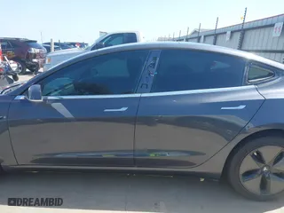 2018 Tesla Model 3 Long Range Battery with VIN 5YJ3E1EA4JF157782, listed as a IAAI auction lot 41774169 with 123,239 mi miles. Bid and sale history available at carsss.com. Image 15.