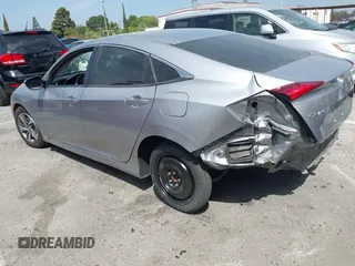 2019 Honda Civic Sedan LX with VIN 2HGFC2F61KH536965, listed as a IAAI auction lot 42030634 with 1 mi miles. Bid and sale history available at carsss.com. Image 3.